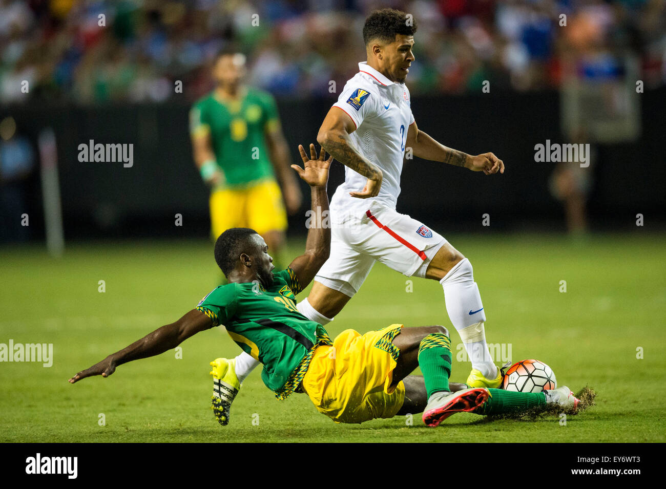 Atlanta, GA, USA. 22nd July, 2015. #20 Jamaica D Kemar Lawrence and #2 USA M DeAndre Yedlin during the CONCACAF Gold Cup semifinal match between USA and Jamaica at the Georgia Dome in Atlanta, GA. Jacob Kupferman/CSM/Alamy Live News Stock Photo