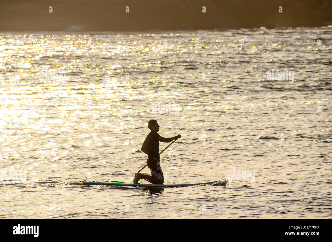 Silhouette Surfer at Sunset Stock Photo - Alamy