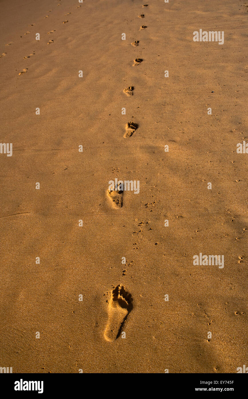 Australia, New South Wales, Central Coast, footsteps in the sand at Avoca Beach Stock Photo
