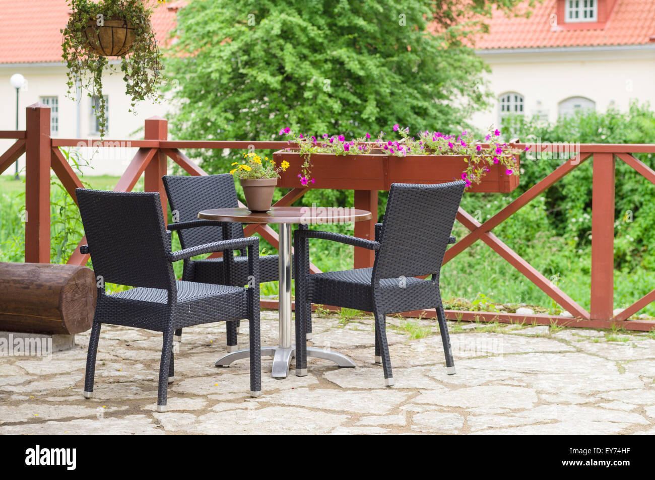 Table and chairs of traditional european outdoor cafe Stock Photo