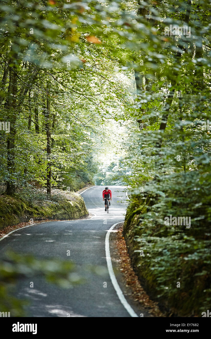 Single cyclist hi-res stock photography and images - Alamy