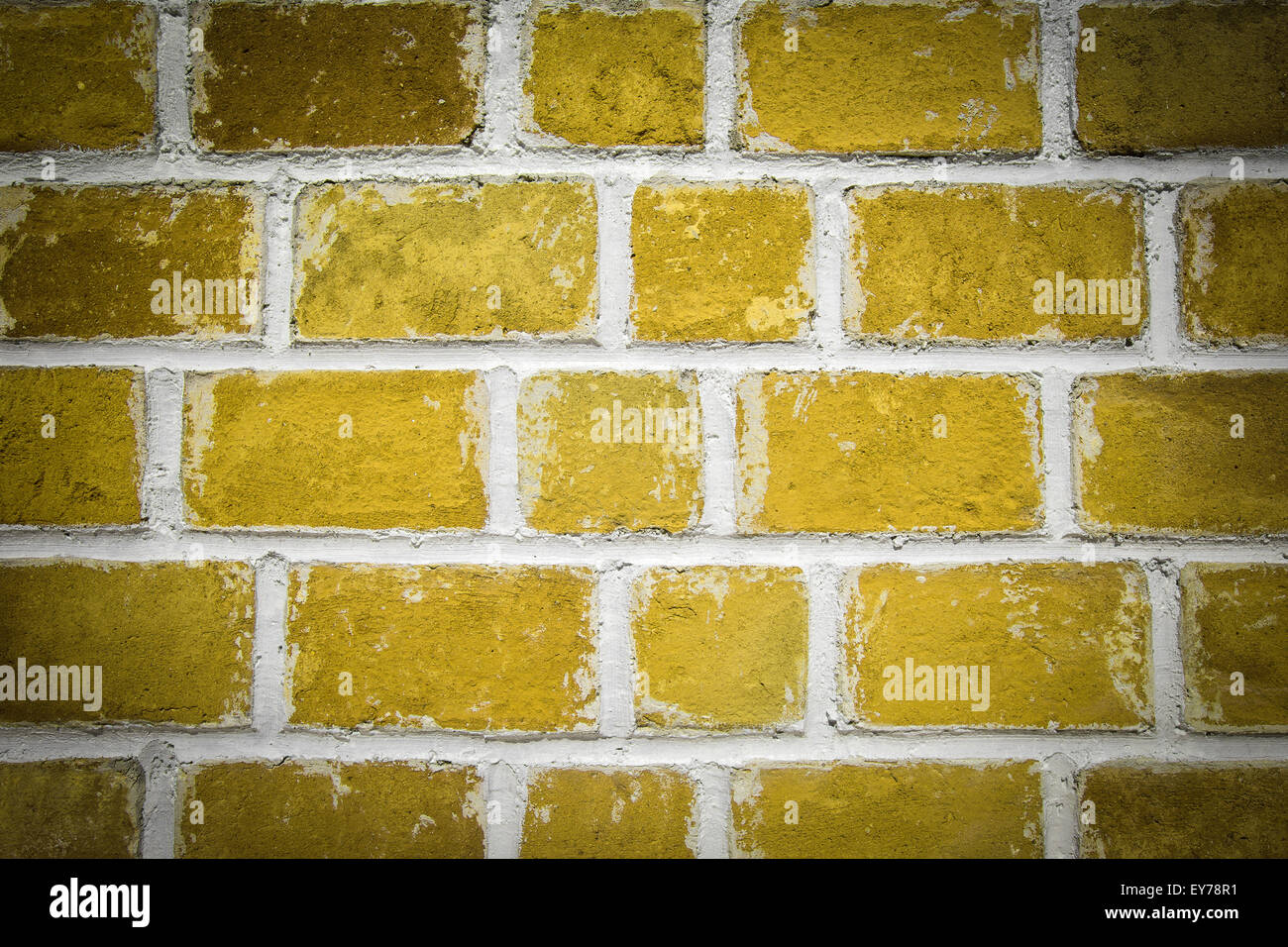 Yellow brick wall background, closeup Stock Photo