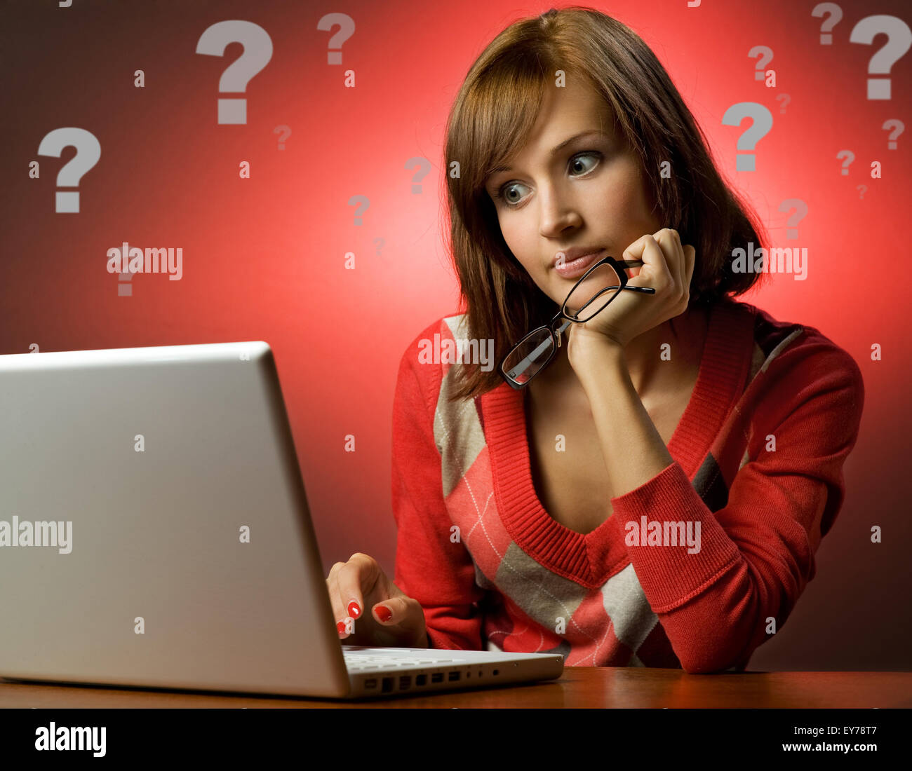 Beautiful young woman working on her laptop Stock Photo - Alamy