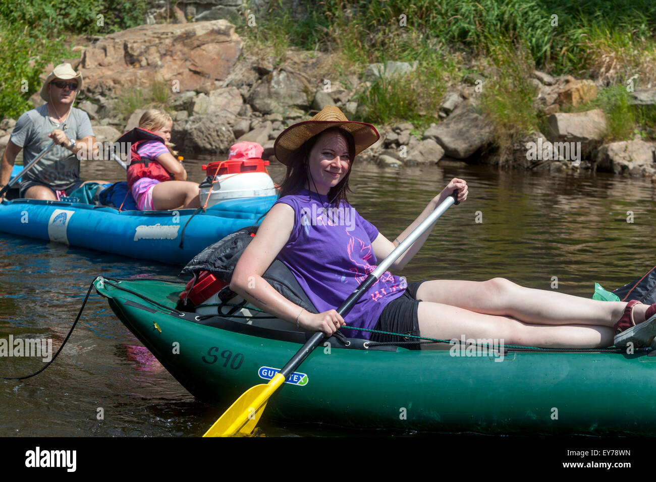 People Woman going down the river Vltava, rafting, South Bohemia, Czech Republic Stock Photo