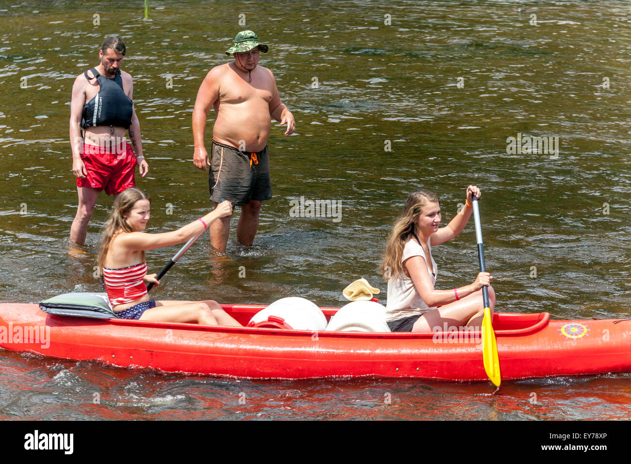 People going down by the river Vltava, girls canoeing river, South Bohemia, Czech Republic summer Stock Photo
