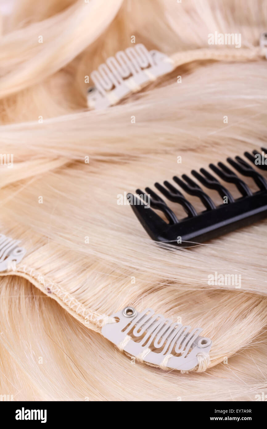Hair extensions, clips and brush Stock Photo Alamy