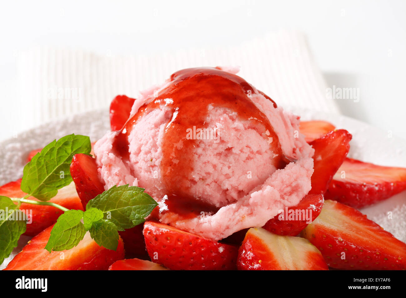 Scoop of strawberry sherbet with fresh fruit Stock Photo