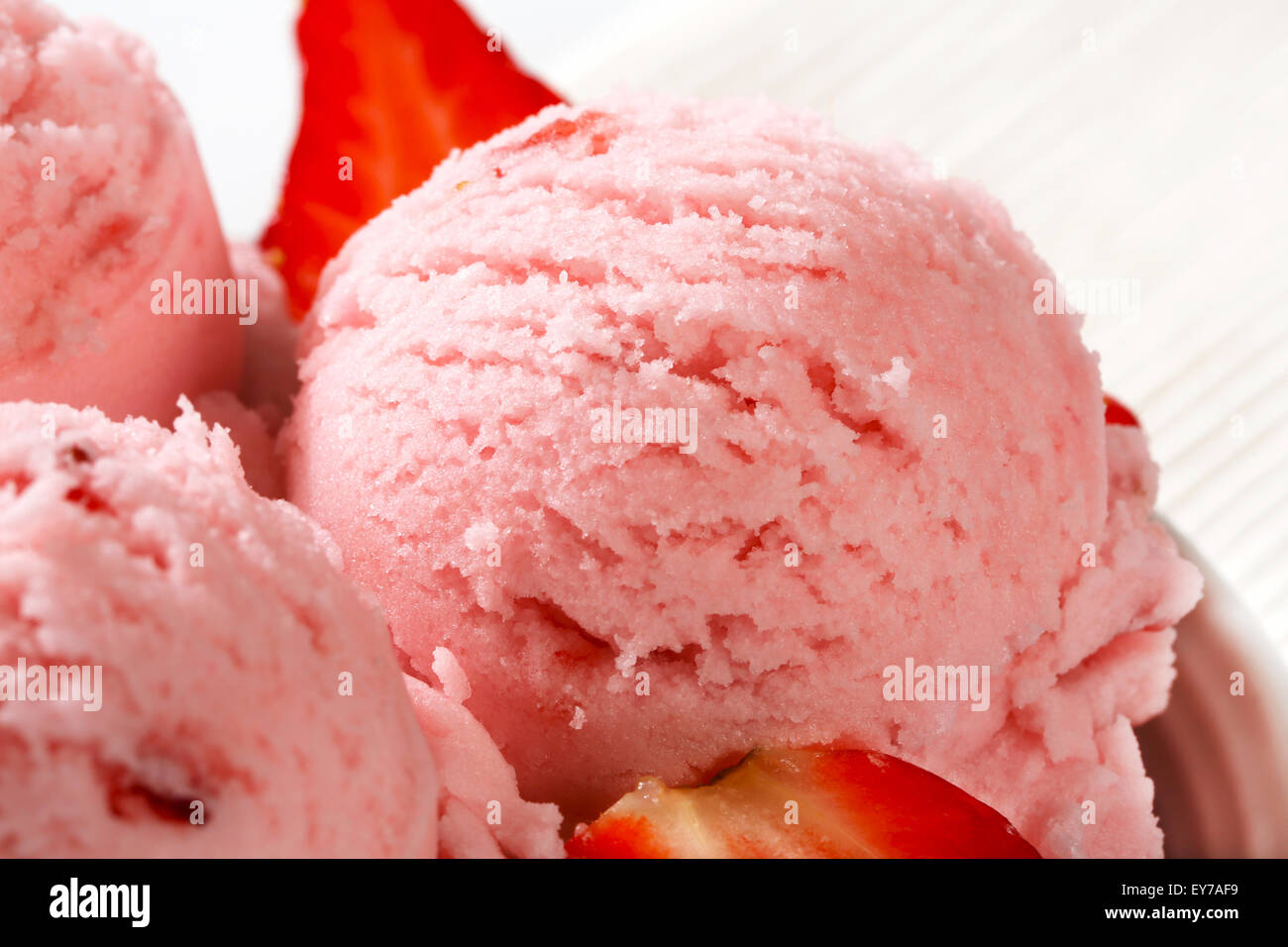 Scoops of strawberry sherbet with fresh fruit Stock Photo