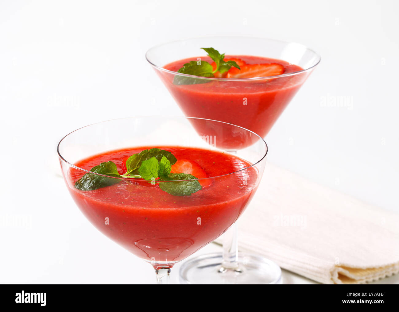 Chilled strawberry puree in stemmed glasses Stock Photo