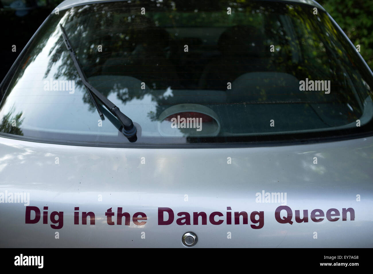 Dig in the dancing queen, a lyric from an Abba song written on the back of a car Stock Photo