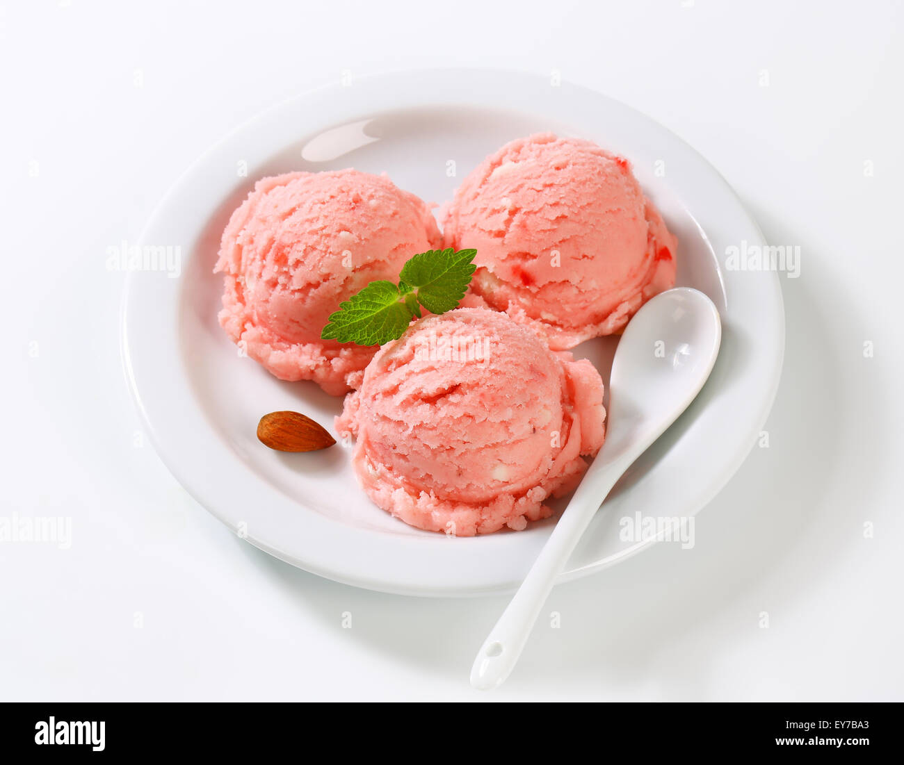 Three scoops of strawberry sorbet Stock Photo