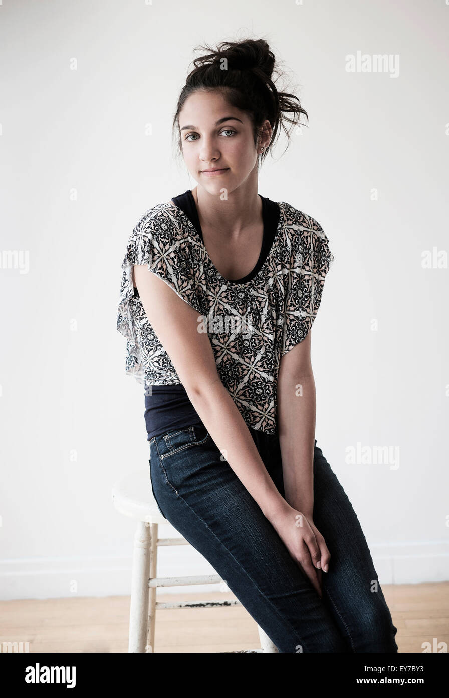 Portrait of teenage girl (14-15) in studio Stock Photo
