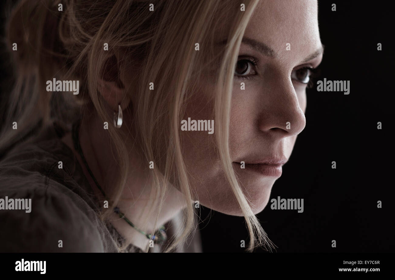 Portrait of blond woman in studio Stock Photo