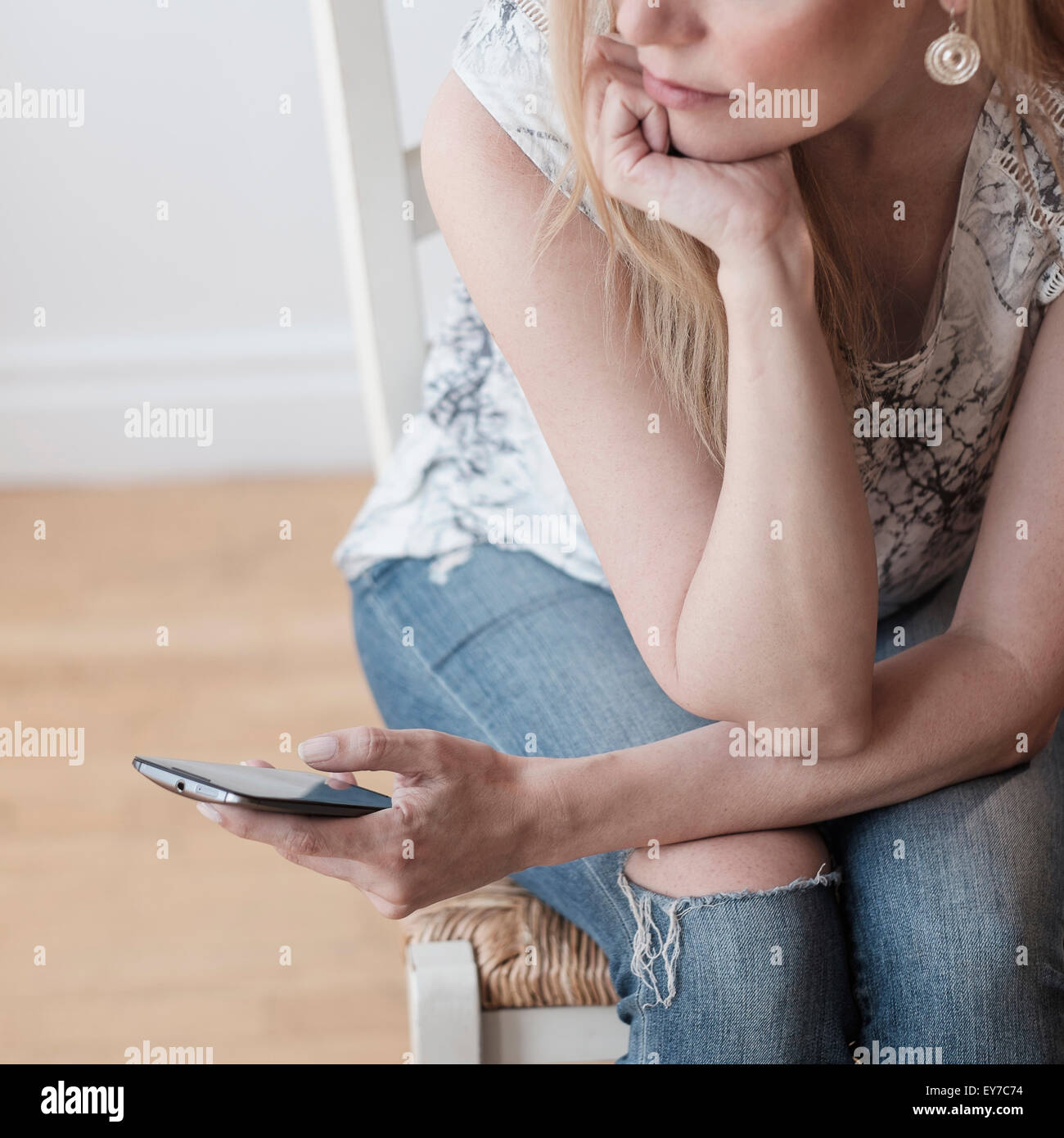 Woman using smart phone Stock Photo