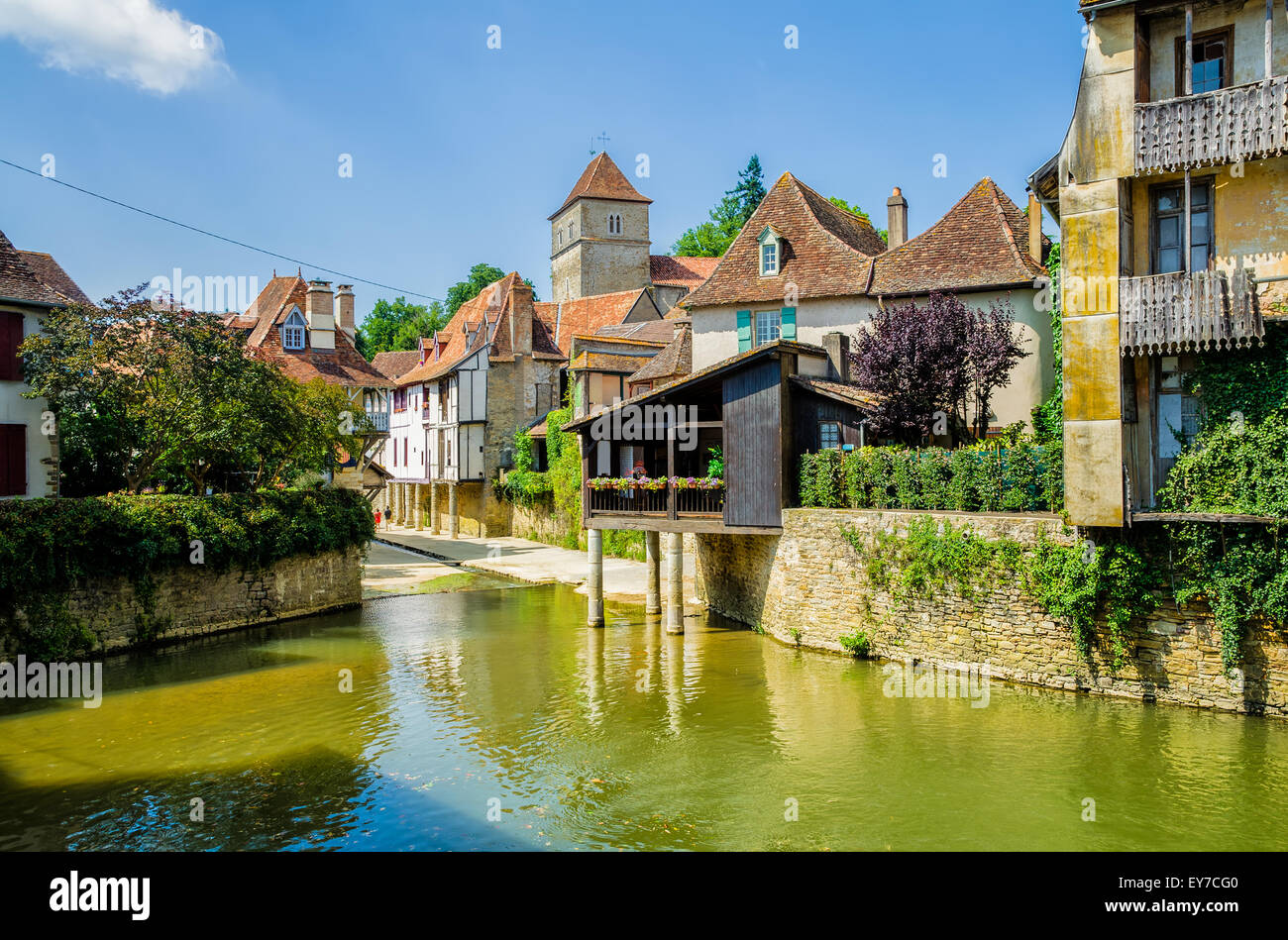 River and buildings in Salies de Bearn, France. Stock Photo