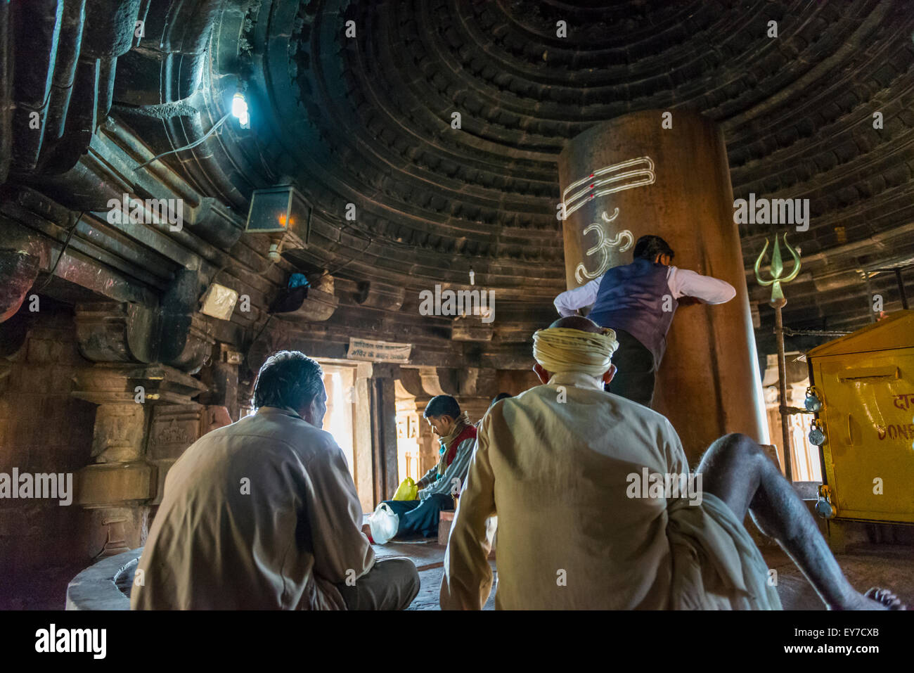 Religious rituals being performed inside a Hindu Temple in Khajuraho, Madhya Pradesh, India Stock Photo