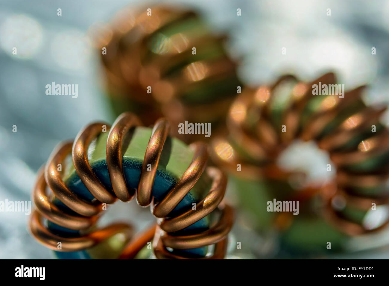 Macrophoto of toroidal copper wired RF chokes from printed circuit