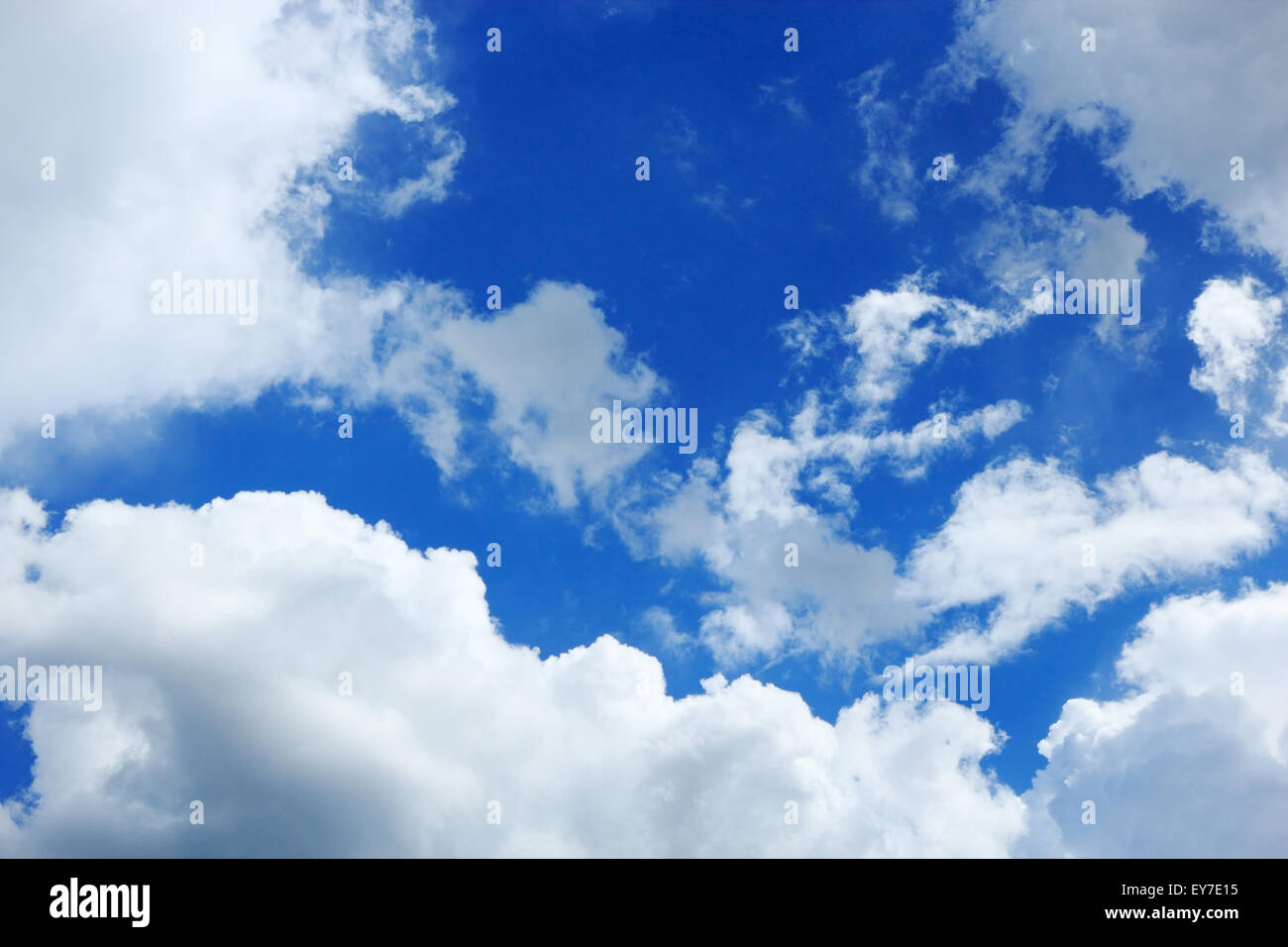 Cumulus clouds hung in the blue sky Stock Photo