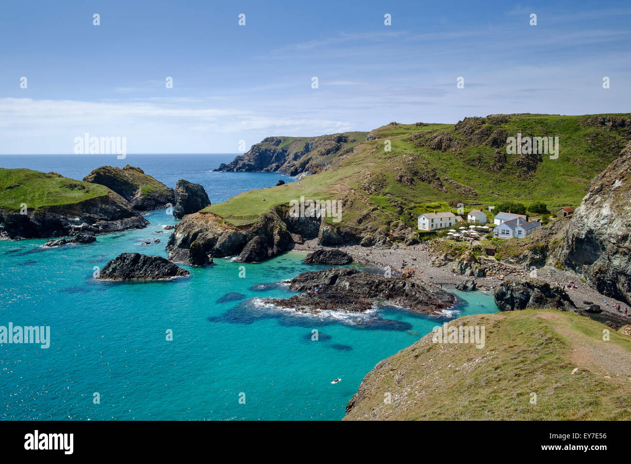 Kynance Cove beach, Cornwall, England, UK - with cafe and coastline at high tide Stock Photo