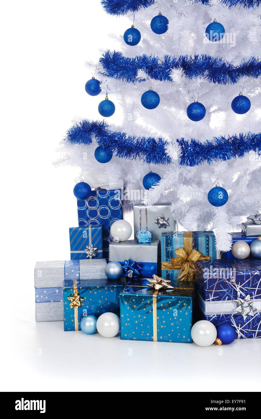 Artificial white christmas tree, decorated with blue ornaments and