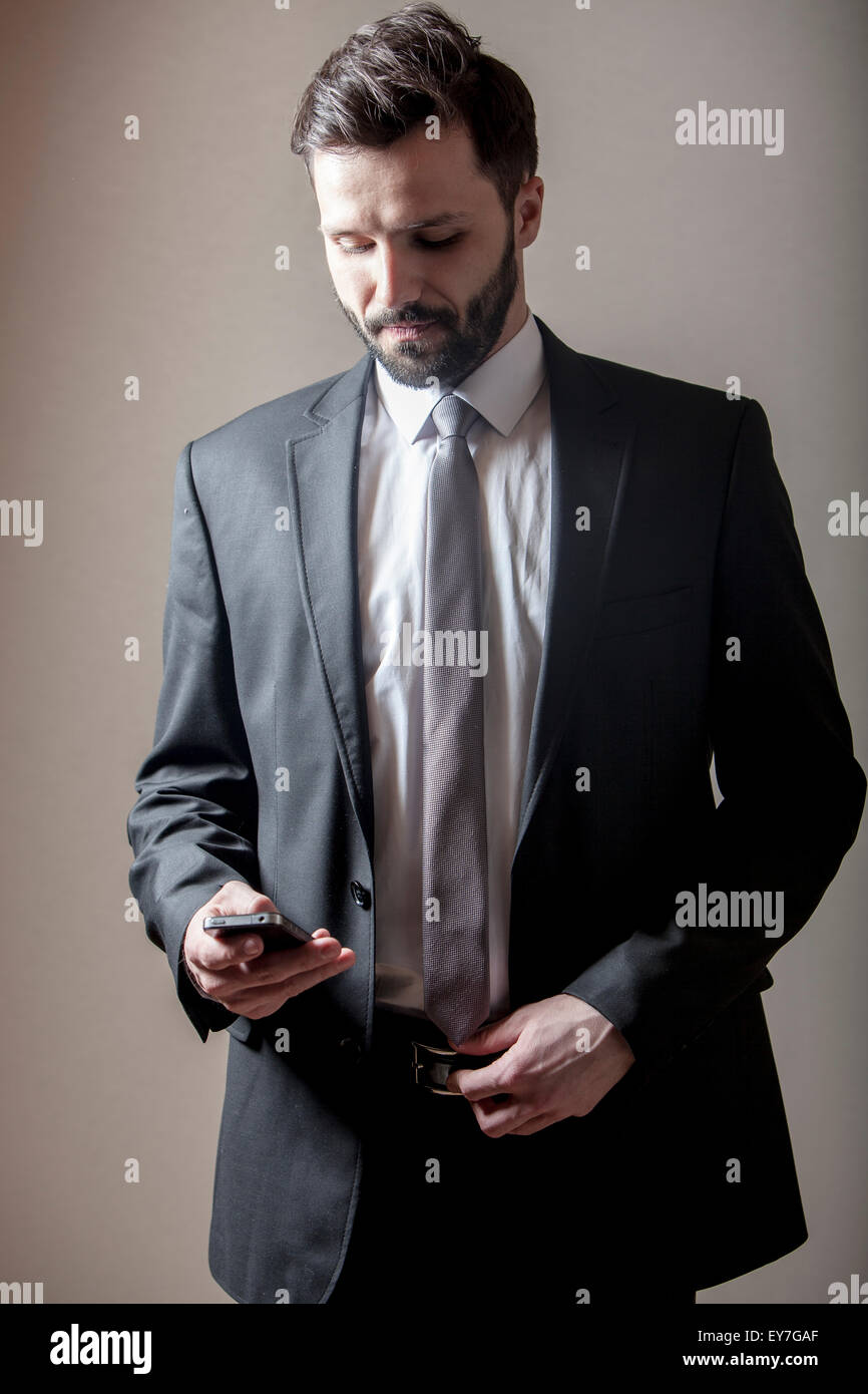 Businessman using smart phone Stock Photo