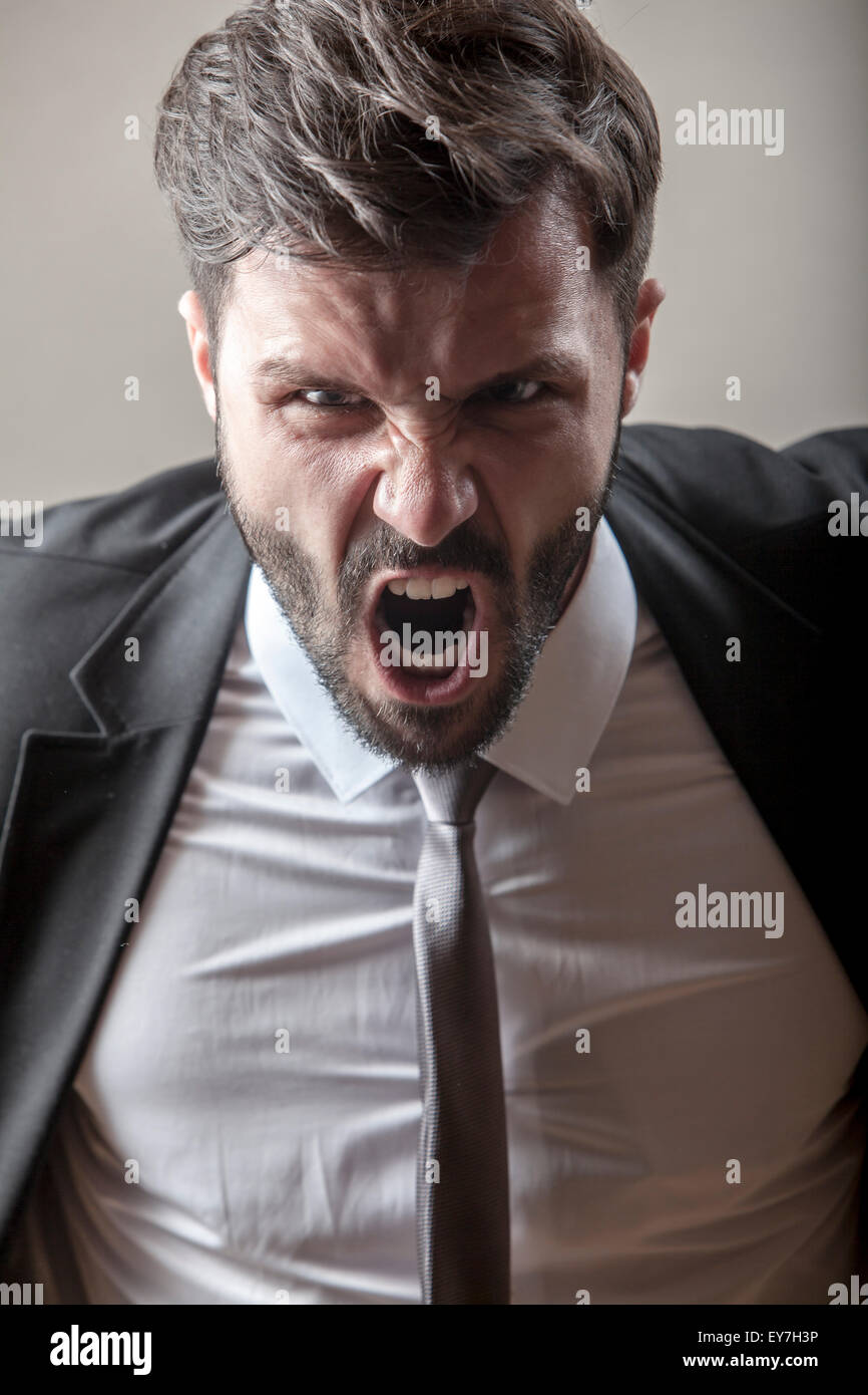 Portrait of businessman screaming Stock Photo