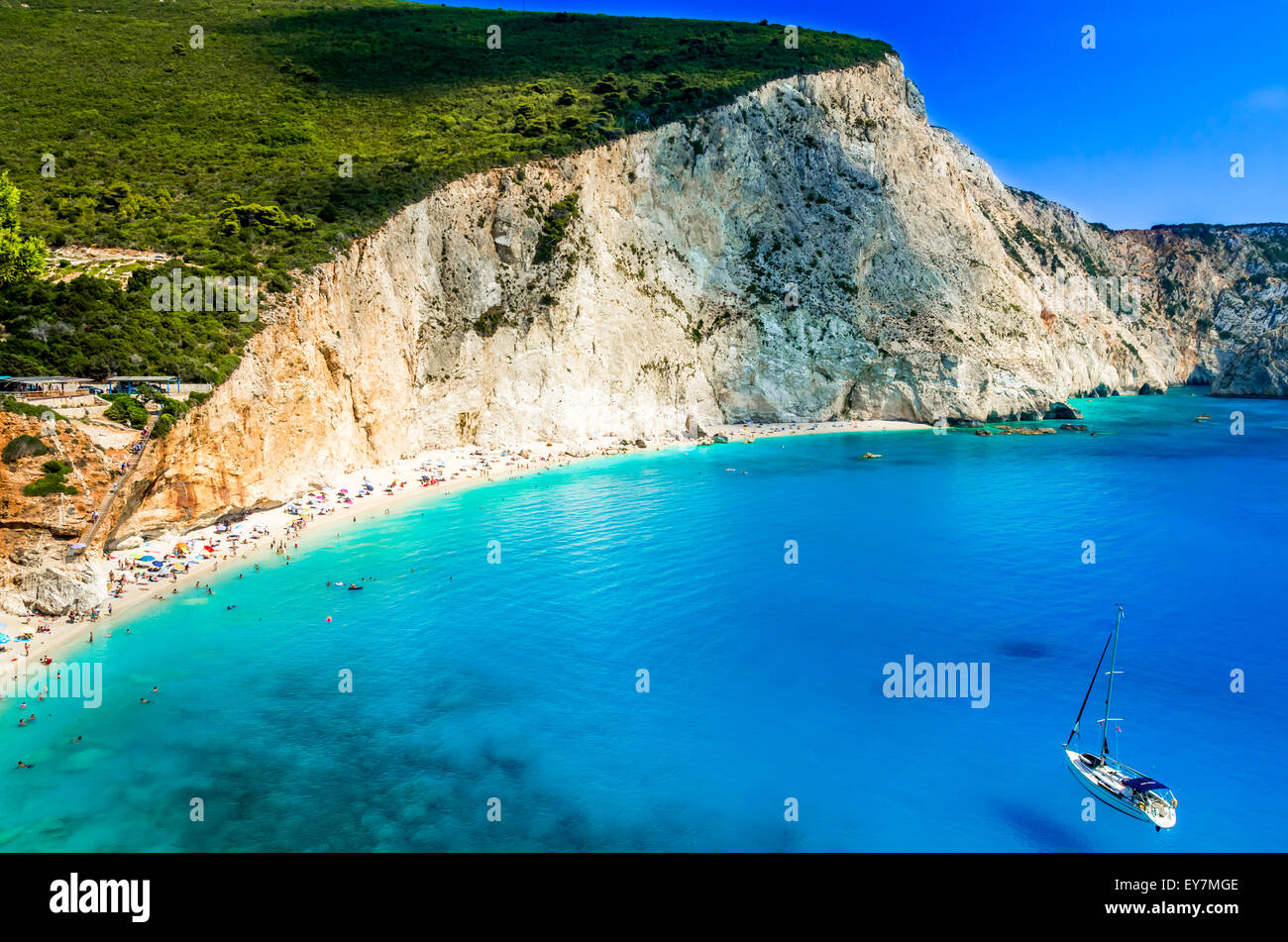 Porto Katsiki beach, Lefkada island, Greece. Beautiful view over the beach. Water is turquoise and there are a boat on the sea. Stock Photo