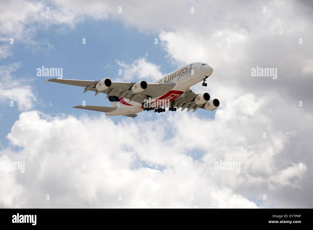 Emirates Airbus A380 passenger jet with landing gear down preparing on final approach to land Stock Photo