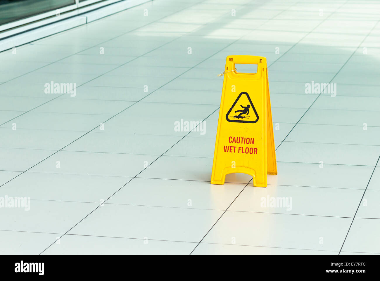 Plate 'caution wet floor' Stock Photo