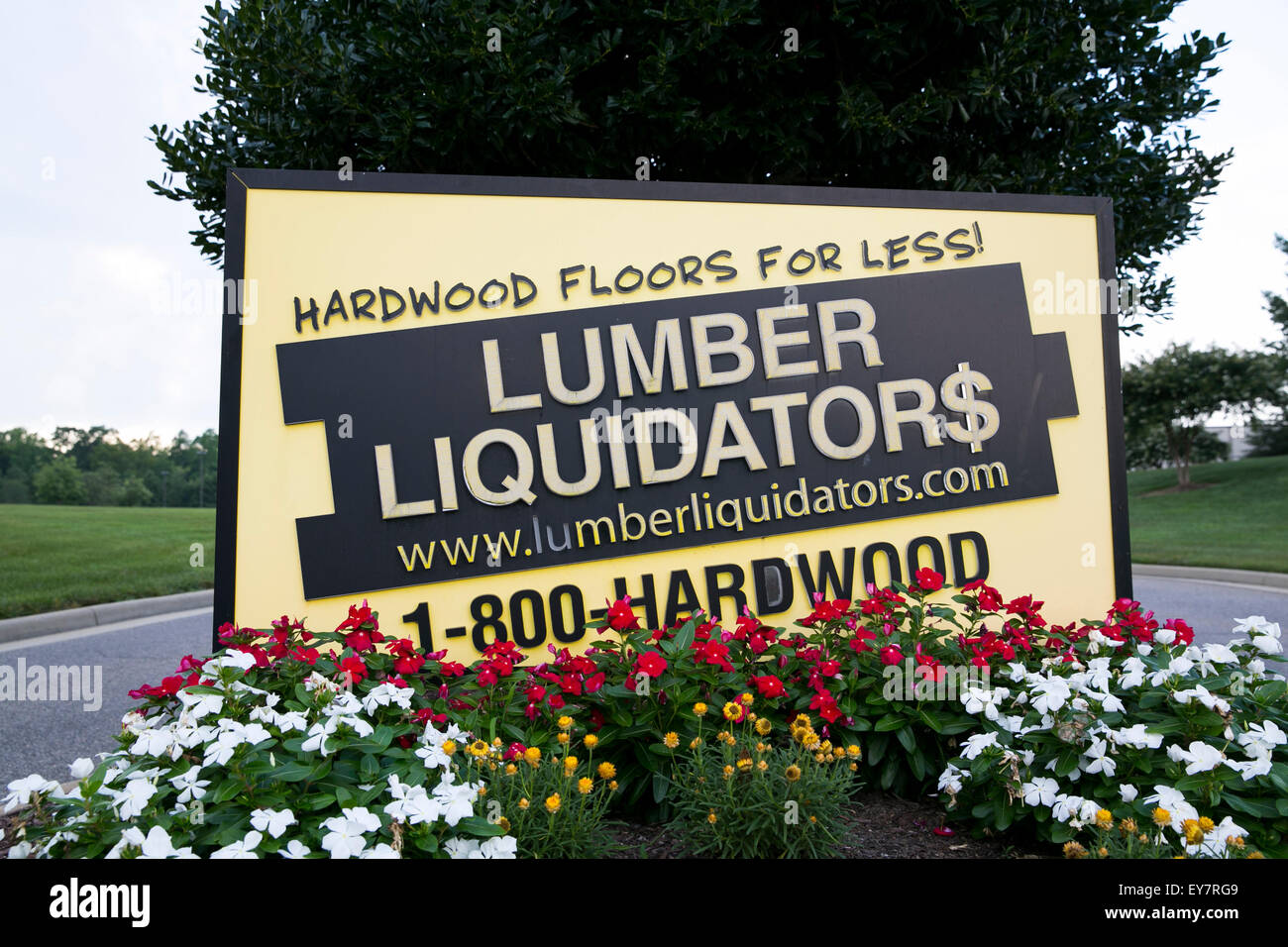 A logo sign outside of the headquarters of Lumber Liquidators, Inc., in Toano, Virginia on July 18, 2015. Stock Photo