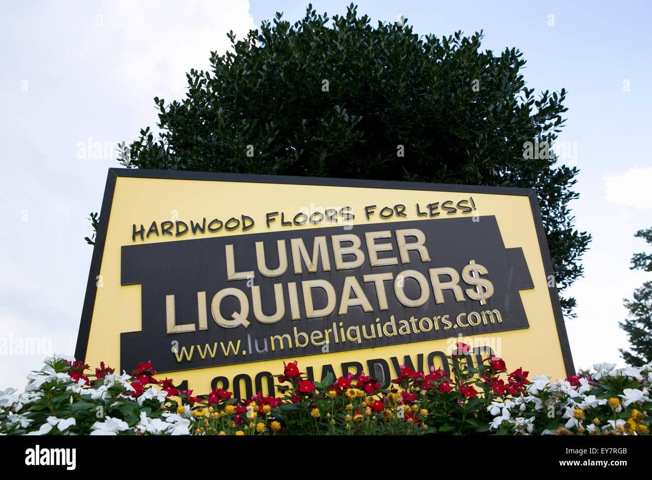 A logo sign outside of the headquarters of Lumber Liquidators, Inc., in