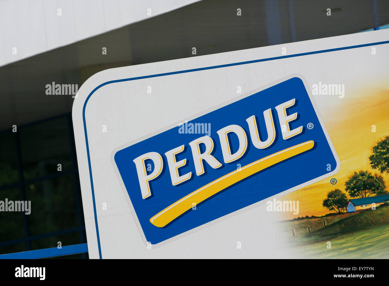 A logo sign outside of a chicken processing facility occupied by Perdue Farms, in Prince George, Virginia on July 19, 2015. Stock Photo