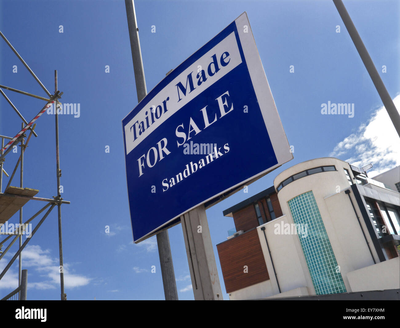 Estate agents For Sale sign promoting luxury new build homes for sale ...