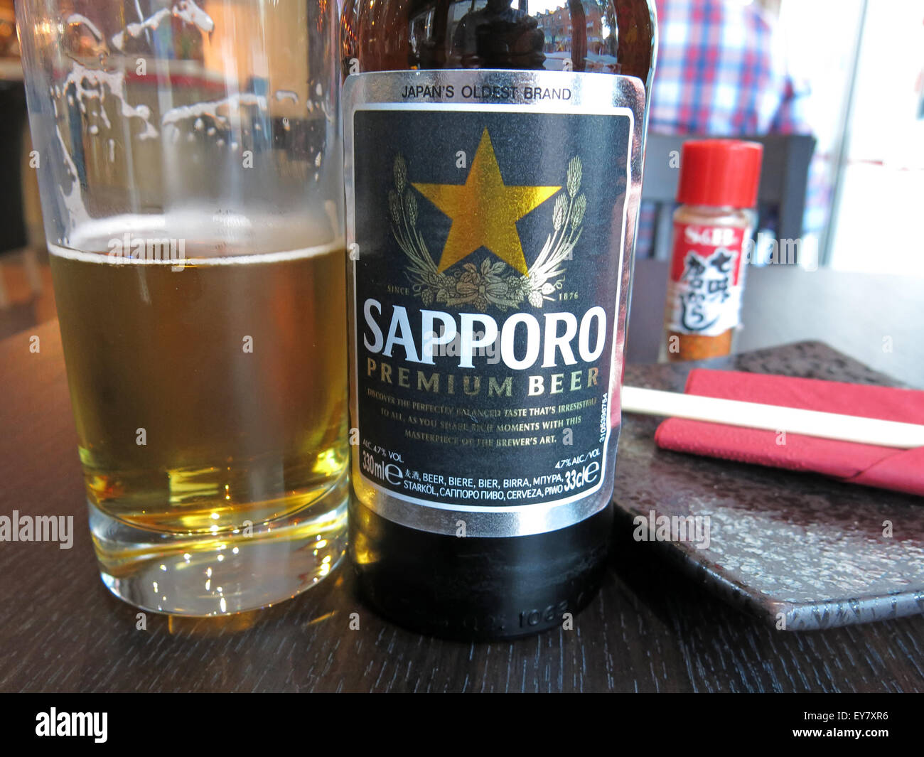 Sapporo beer - Meal & drinks, in a Japanese Restaurant, Leeds, England, UK- Sashimi Tempora Miso Soup Stock Photo