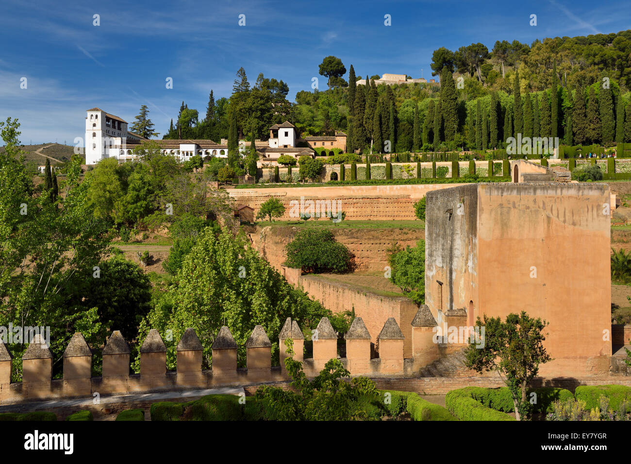 Alhambra crenellated parapet and Tower of the Judge with Medieval walkway to the Generalife Granada Spain Stock Photo