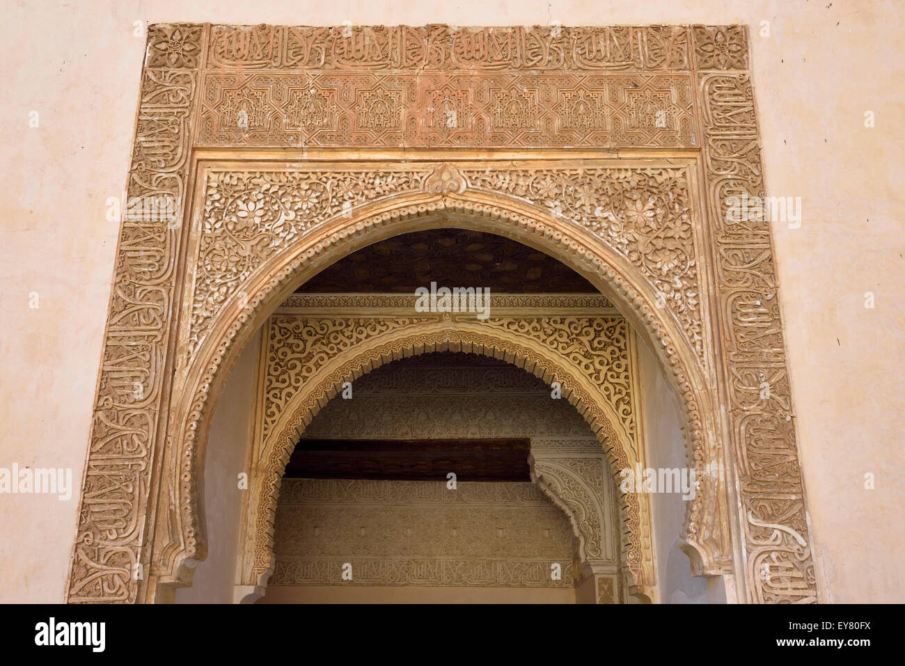 Keyhole arabic arched doorway at the court of Myrtles Comares Palace Nasrid Alhambra Spain Stock