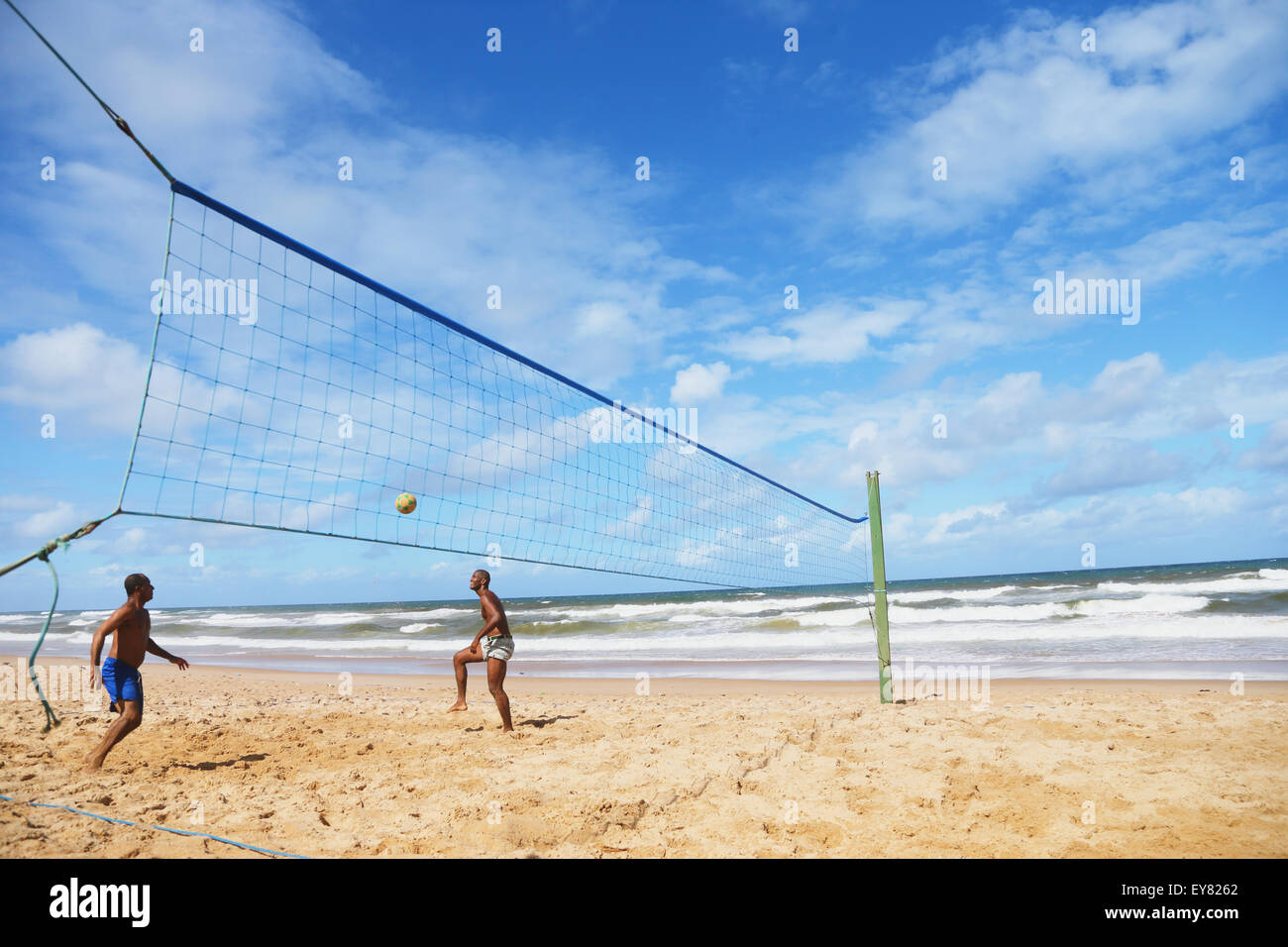 Playing beach volley ball hires stock photography and images Alamy