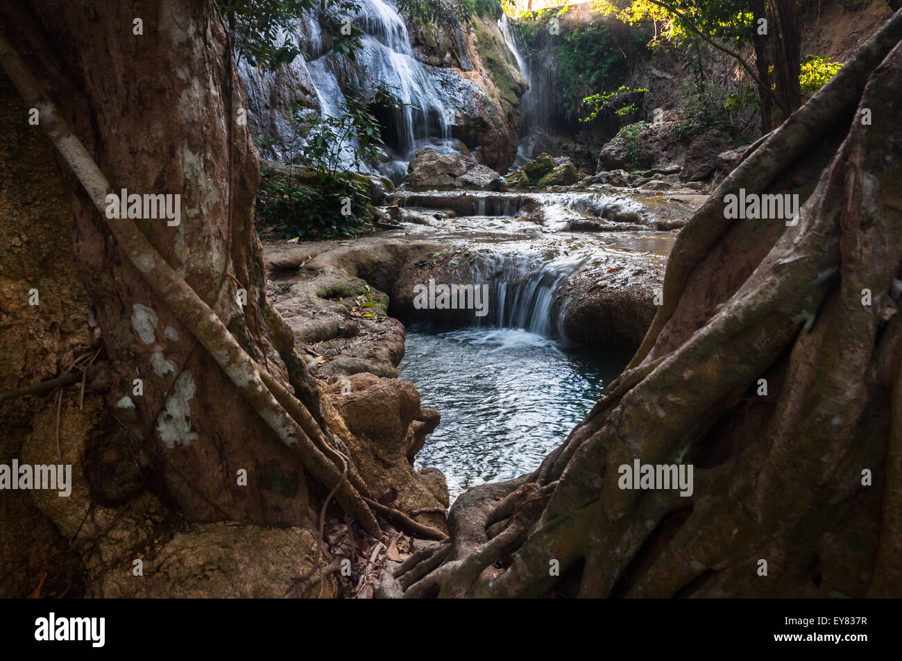 Waterfalls and pond surrounded by forest in Oenesu near Kupang, East Nusa Tenggara, Indonesia. Stock Photo