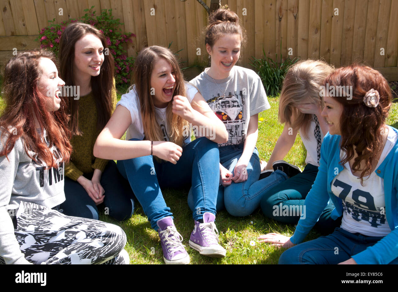 Happy group of teenage girls laughing Stock Photo