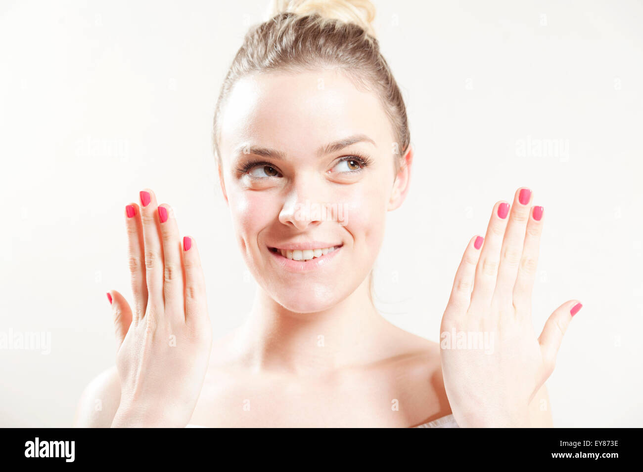 Young woman showing fingernails Stock Photo