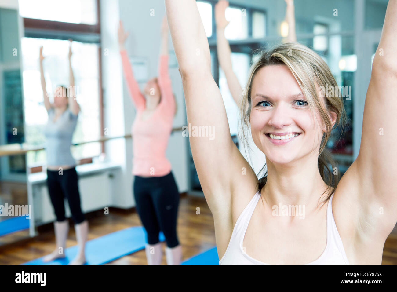 Women stretching in Pilates class Stock Photo Alamy