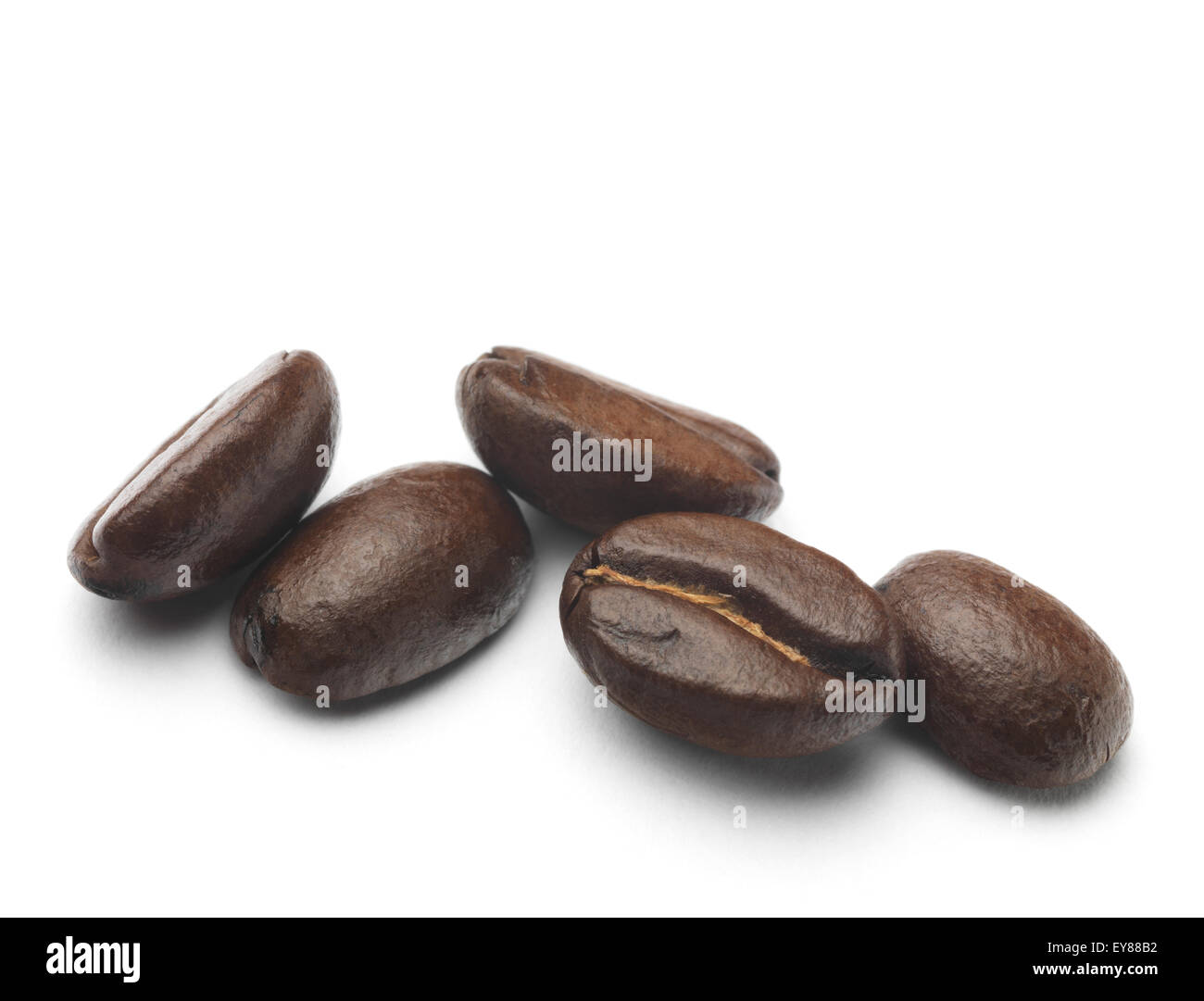 Roasted Coffee Beans isolated on a white background Stock Photo - Alamy