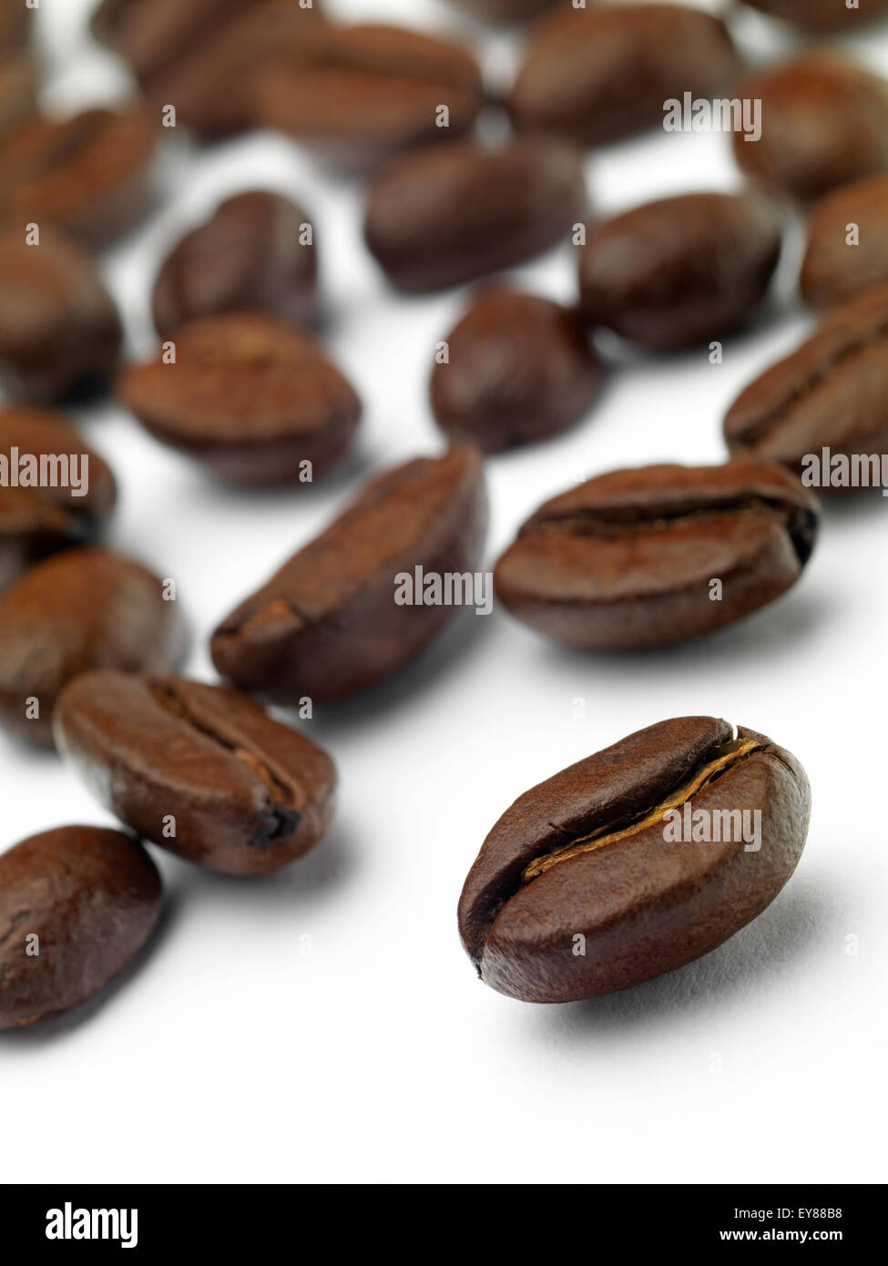Roasted Coffee Beans isolated on a white background Stock Photo - Alamy