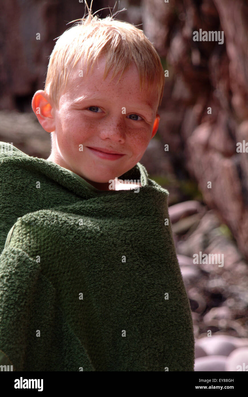 Portrait of young boy smiling Stock Photo - Alamy