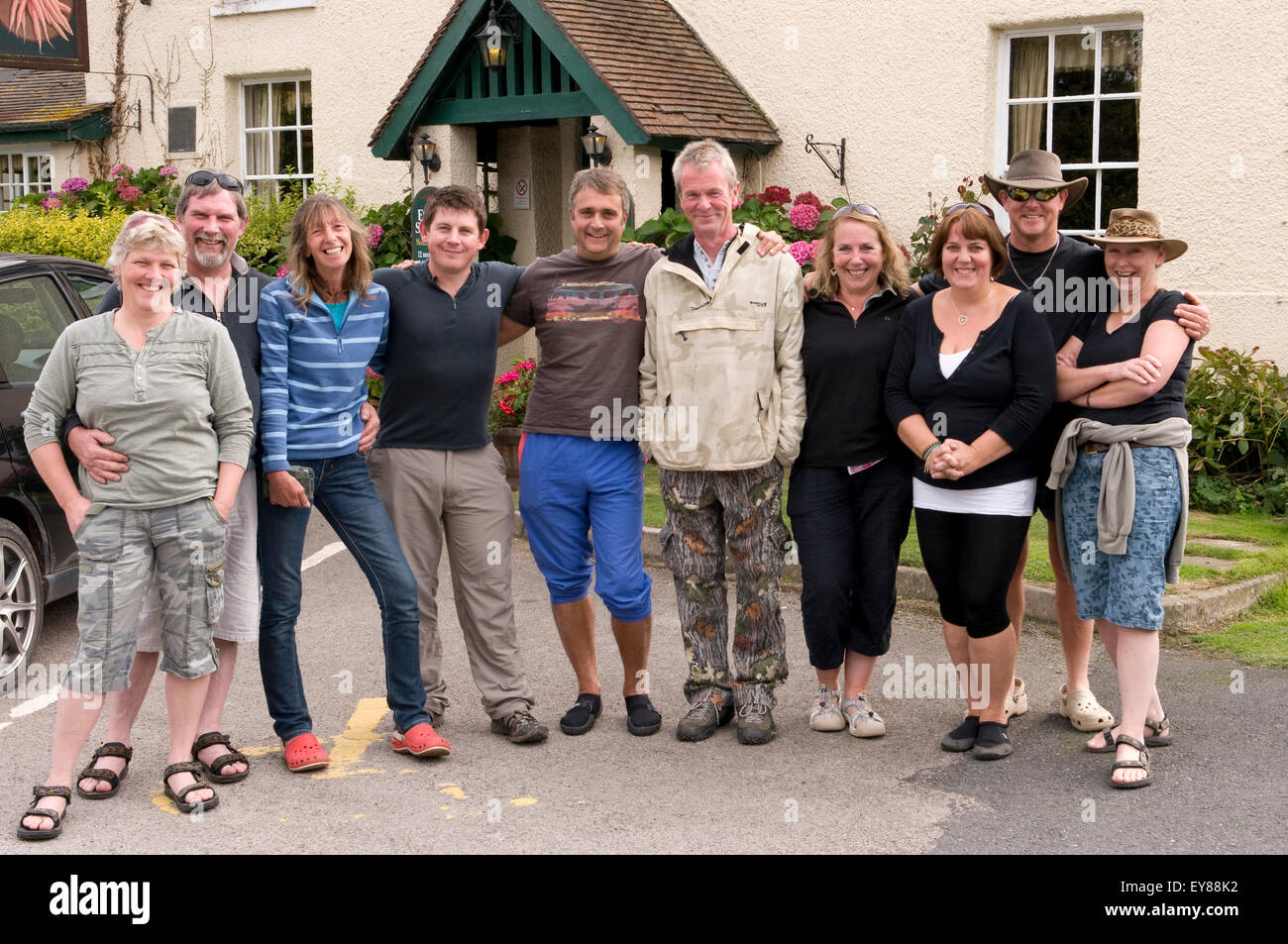 Group of people posing for a photograph Stock Photo - Alamy