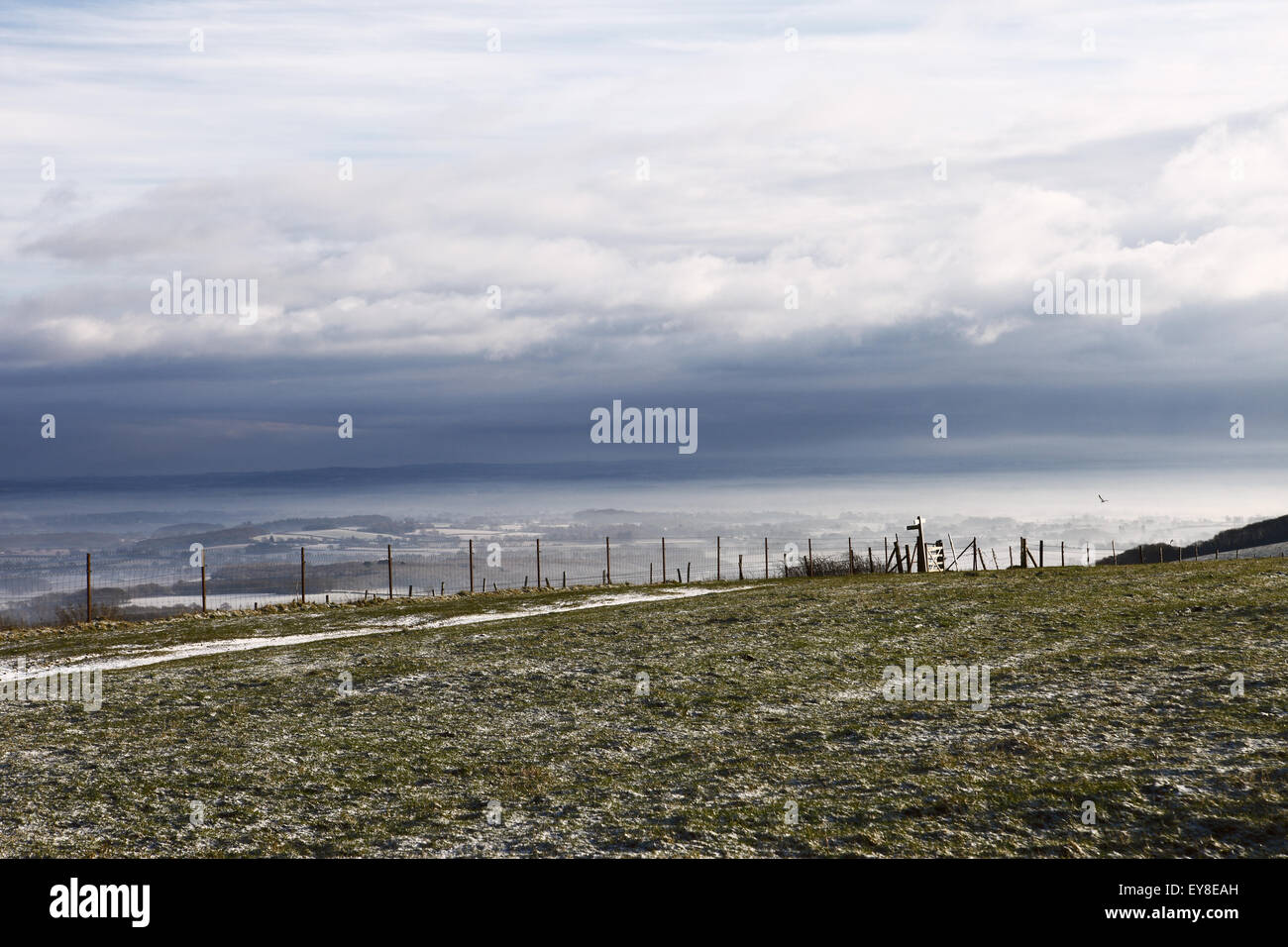 Ditchling Beacon on a cold and snow scattered winter day on the South Downs Way, Sussex, England, UK. Stock Photo