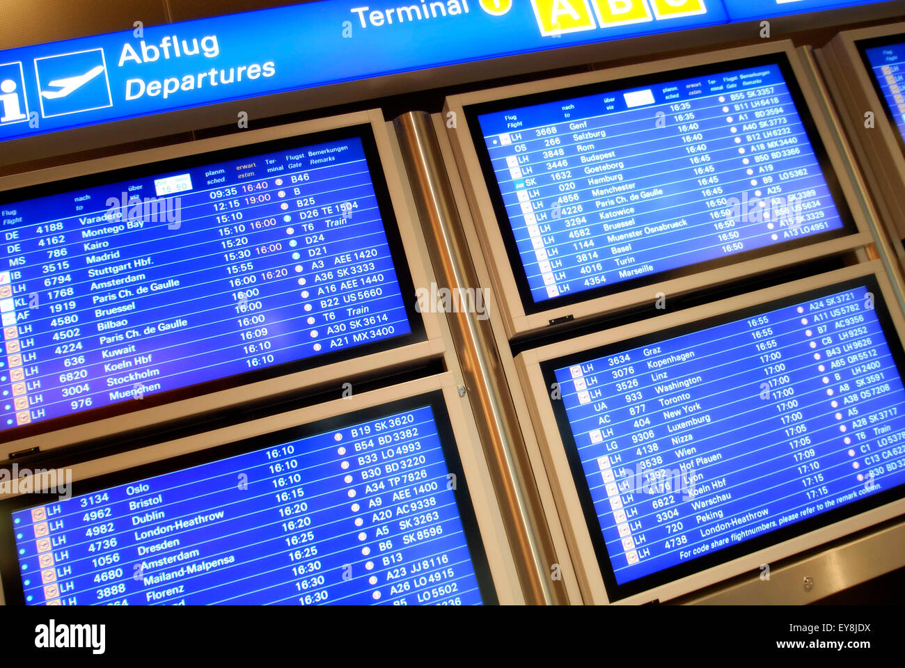 Information monitors at airport Stock Photo