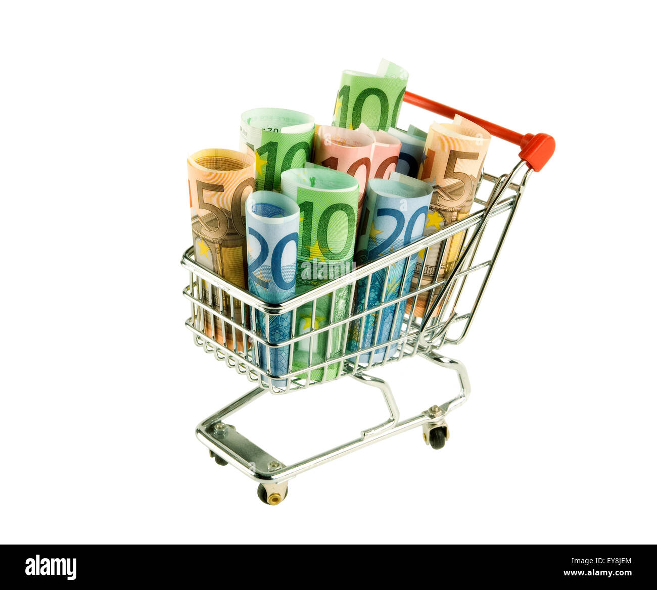 Isolated shopping cart with euro banknotes. Stock Photo