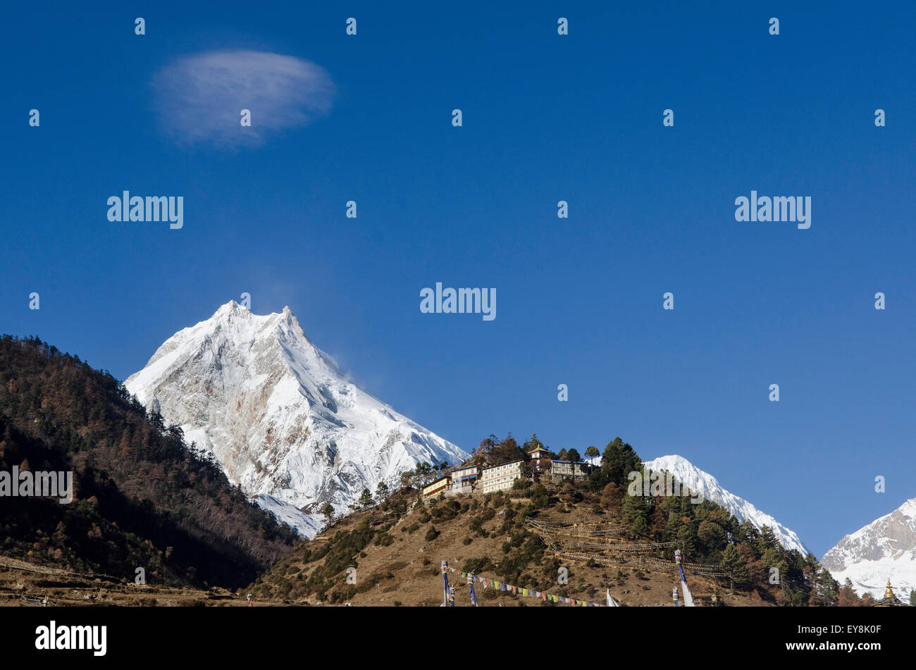 The view of Mt. Manaslu from the village of Lho in the Nubri valley of Nepal Stock Photo