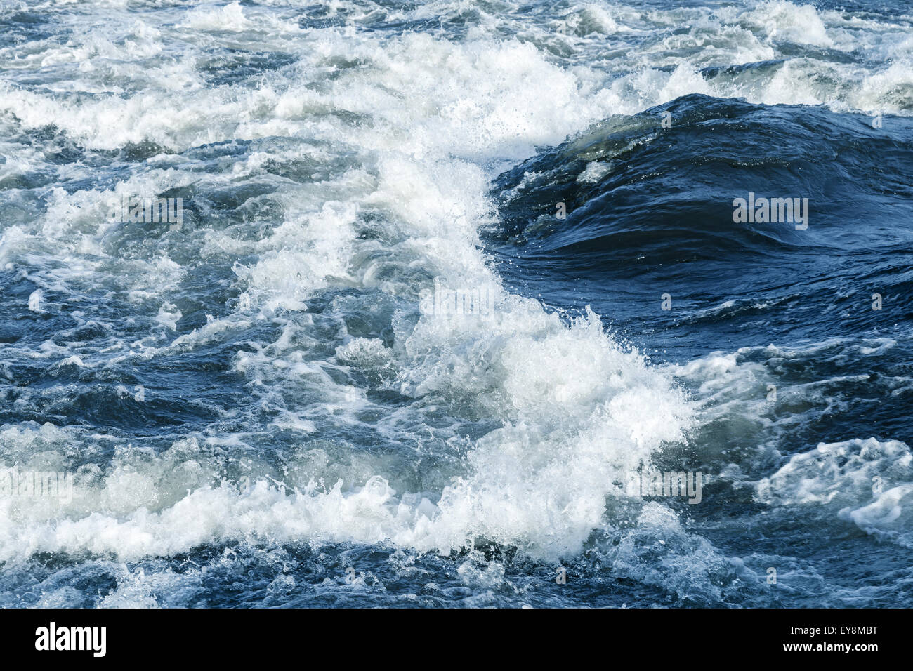 Fast river water background with waves, foam and splashes Stock Photo